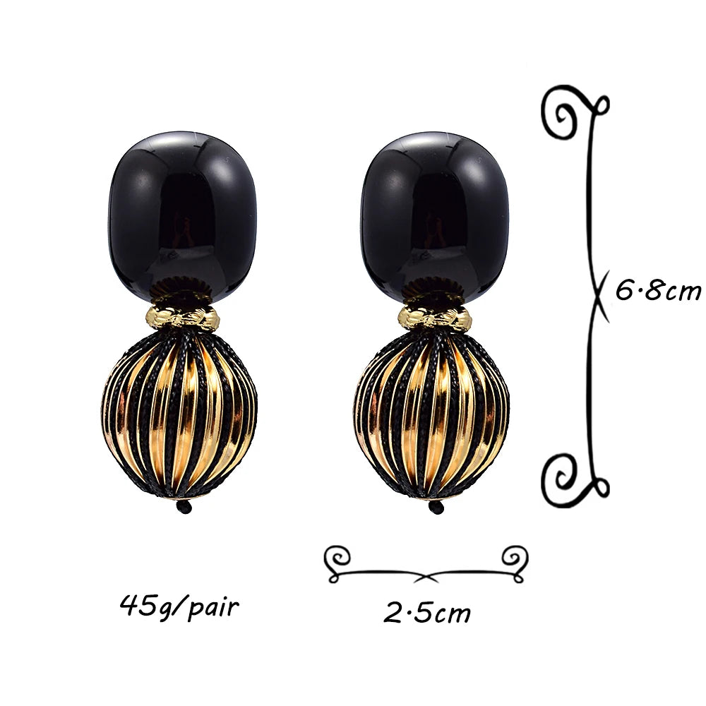 Noraa Statement Earrings