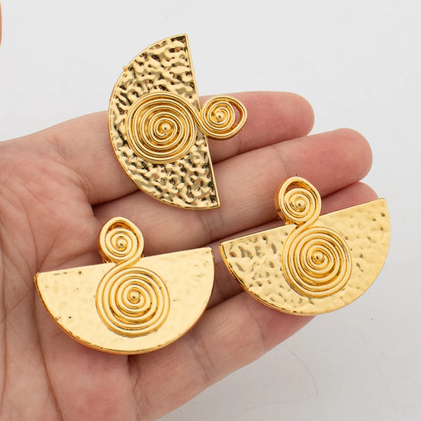 Makuu Swirl Earrings & Ring